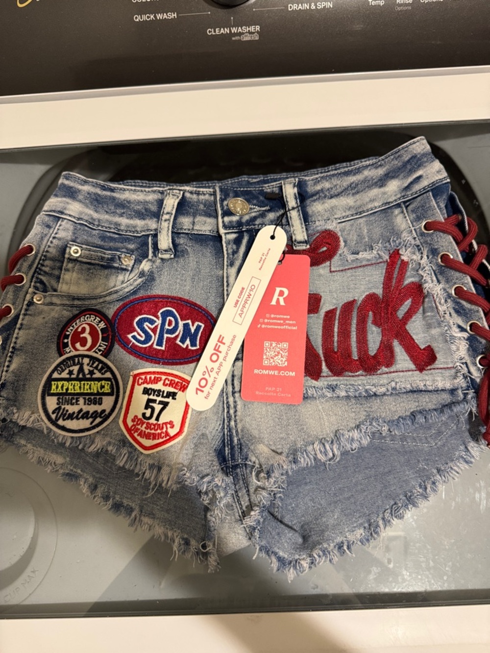 ROMWE Distressed Patchwork Lace-Up Denim Shorts in Blue with Red Accents